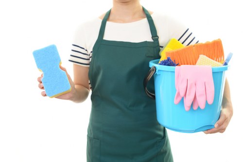 Professional oven cleaner in Edgware deep cleaning a kitchen oven